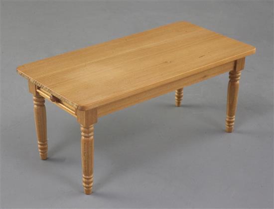 Denis Hillman. A Victorian style miniature kitchen dining table, the top 5.5in. x 2 7/8in.